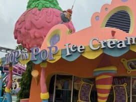 A brightly painted ice cream shop storefront
